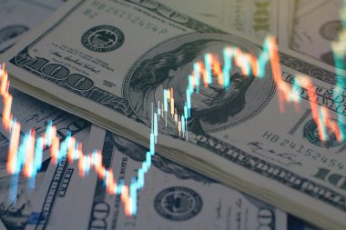Borsa ve fintech kavramı. Koyu mavi arkaplan üzerindeki bulanık dijital grafikler.