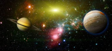 Gezegen ve galaksinin yıldızları serbest uzayda. Bu görüntünün elementleri NASA tarafından desteklenmektedir .