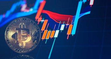 Sanal kripto para birimi kavramı. Bitcoin kripto para birimi arkaplanda bulanık mum boyası şeması ve yansıması ile