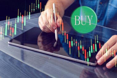 Businessman analyze sales data and graph economic growth. Planning and business strategy Analysis of forex trading Finance and banking.