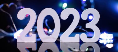 2023 New Year Celebration Blurred lights in the background.