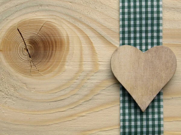 Fond en bois avec un ruban à carreaux — Photo