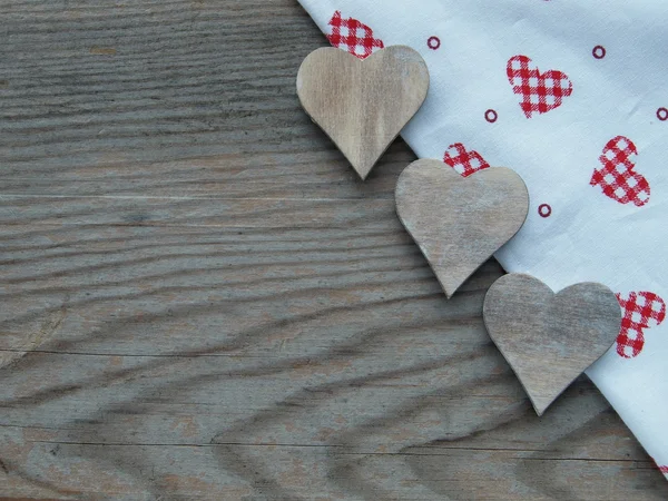 Wooden background with hearts — Stock Photo, Image