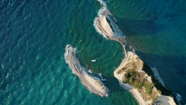Aerial drone view of Cape Drastis - rock formation, Corfu, paradise island in Greece. Ionian Sea with azure clear water. — Stock Video