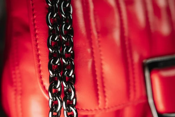 Beautiful red leather bag with gun metal black chain handle. Fashion accessories, trendy quilted bag