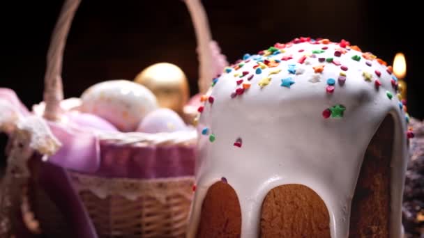 Homemade Easter cake background. Festive pastry, colorful eggs in basket. Holiday Christian tradition. Religion symbol concept. — Wideo stockowe