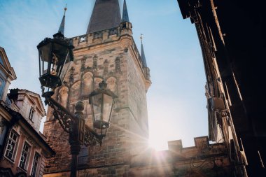 Famous medieval Charles - Karlov bridge across Vltava river. Historic, old district of european capital. View of town hall tower. High quality photo