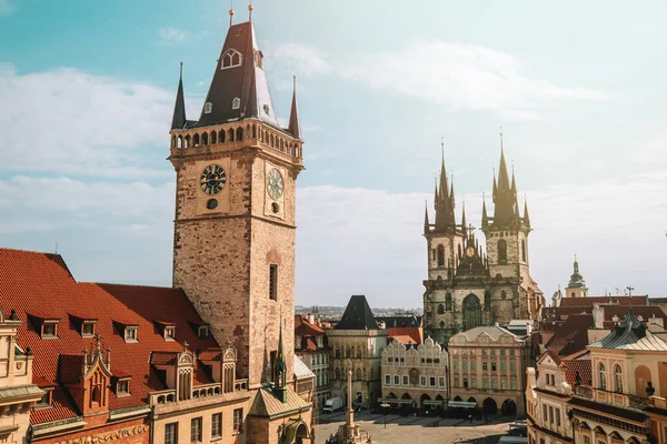 Old Prague town square with Church of our Lady before Tyn, astronomical chimes. Famous historical, gothic style buildings. Sunny cityscape in european capital. High quality photo