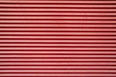 Paralel kırmızı dikey çizgi arkaplanı. Metalik doku, doğal soyut çizgiler. Model ve tasarım için mükemmel. Kusursuz desen. Yüksek kalite fotoğraf