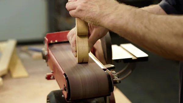 Hands Carpenter Sharpens Wooden Part Grinding Machine Handwork Concept Woodworking — 图库照片