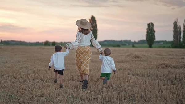 Two Ukrainian Boys Mother Running Together Open Area Wheat Field — Stockfoto