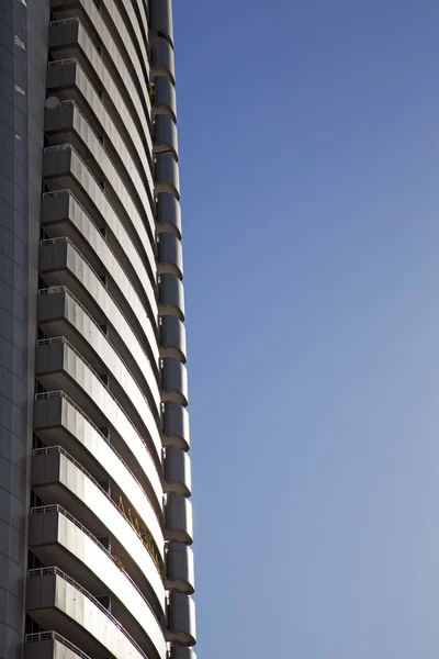 Perspective and underside angle view of modern glass building sk — Stock Photo, Image