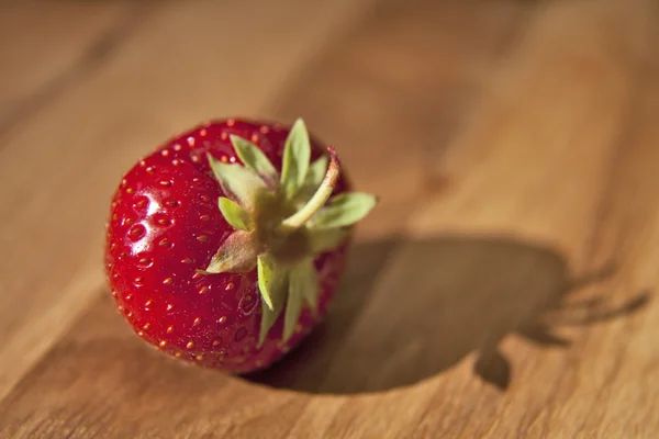 Fresh strawberrie on wooden table — Stock Photo, Image