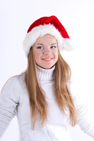 Beautiful girl in a Christmas hat — Stock Photo, Image