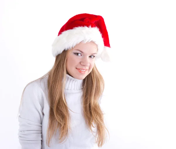 Beautiful girl in a Christmas hat — Stock Photo, Image