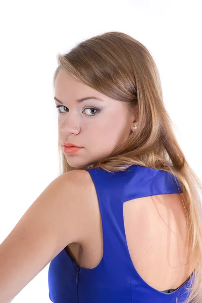 Meisje in een blauwe jurk met cut ruggen — Stockfoto