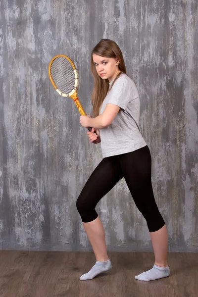 Girl with tennis racket — Stock Photo, Image