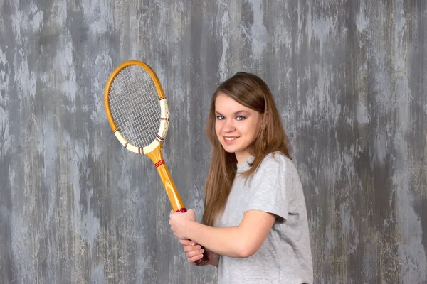 Girl with tennis racket — Stock Photo, Image