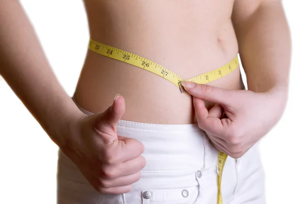 Woman measuring her waist — Stock Photo, Image