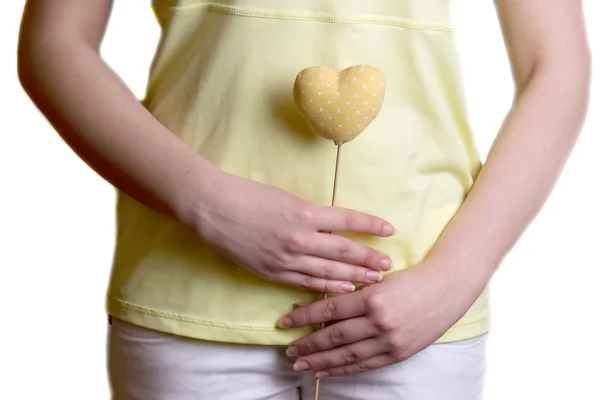 Yellow heart with polka dots on a stick — Stock Photo, Image