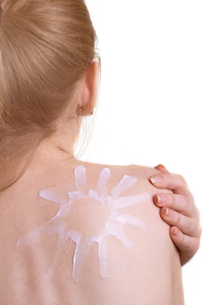 Creme solar desenhado em seu ombro — Fotografia de Stock