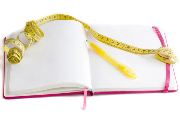 Messgerät und Ernährungstagebuch — Stockfoto