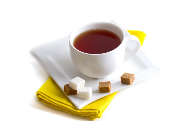 White cup of tea on a napkin — Stock Photo, Image