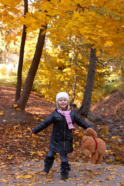 Adorable girl with teddy bear — Stock Photo, Image