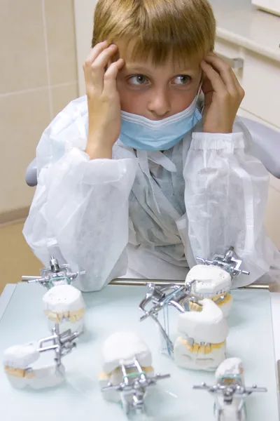 Boy wants to be an orthodontist — Stock Photo, Image