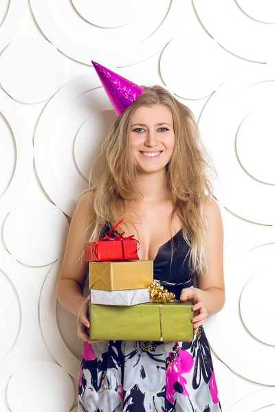 Beautiful girl with gift boxes — Stock Photo, Image