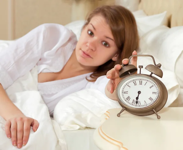 Woman's hand off the alarm clock — Stock Photo, Image