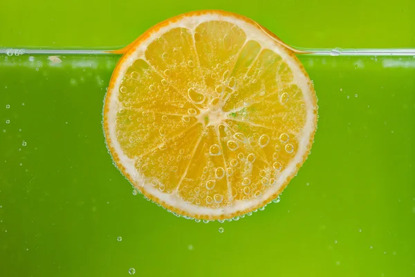 Citrus squeezer with lemons — Stock Photo, Image