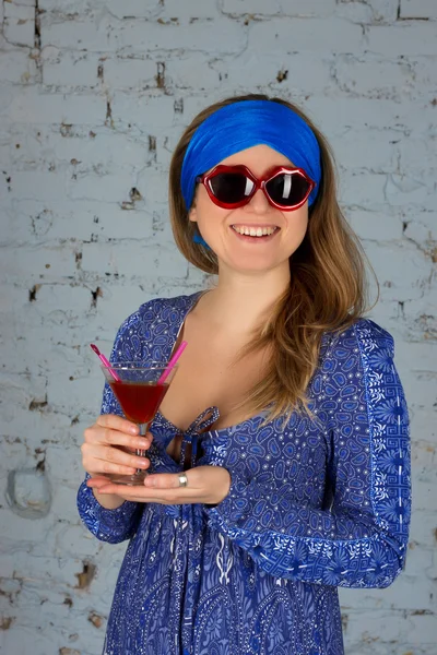 Woman drinking a cocktail — Stock Photo, Image