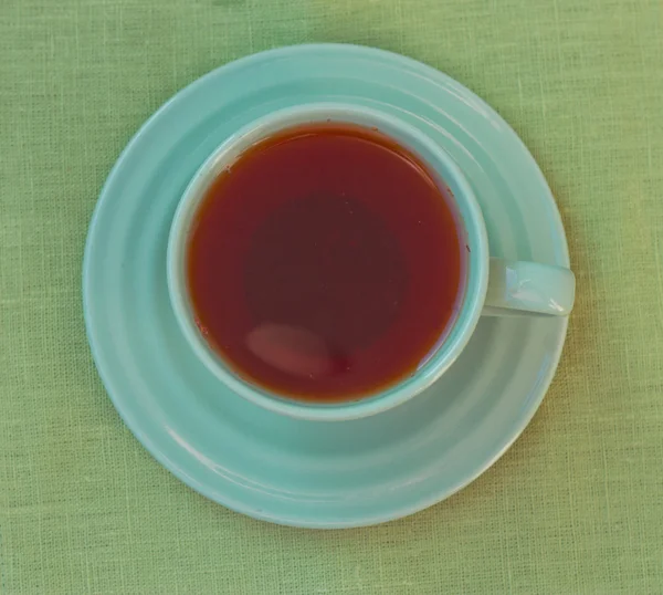 Zelený hrnek čaje. pohled shora — Stock fotografie