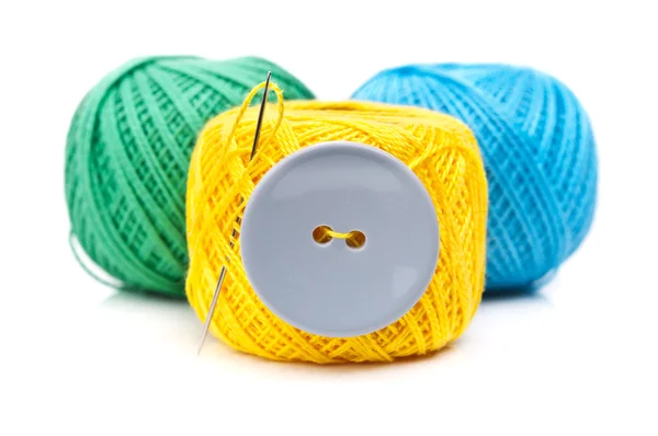 Button and ball yarn — Stock Photo, Image