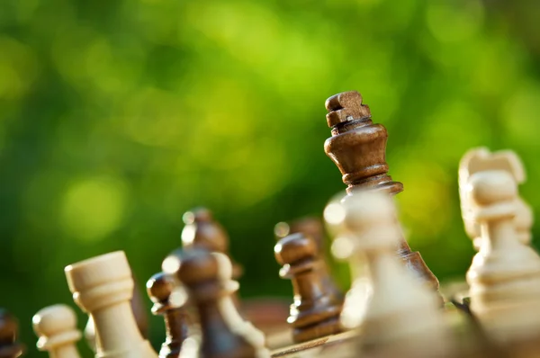 Chess pieces on a table — Stock Photo, Image