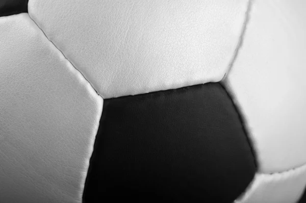 Bola de futebol no fundo — Fotografia de Stock