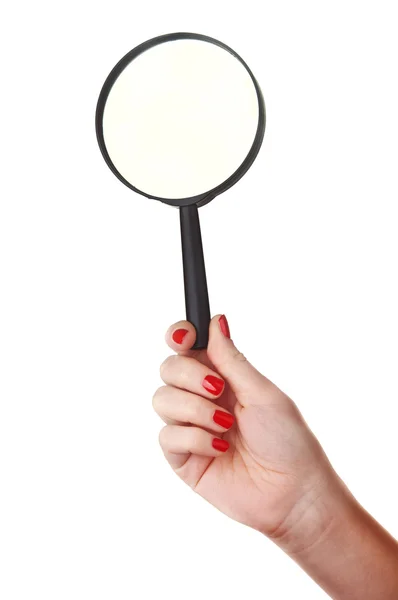 Woman holds magnifying glass — Stock Photo, Image