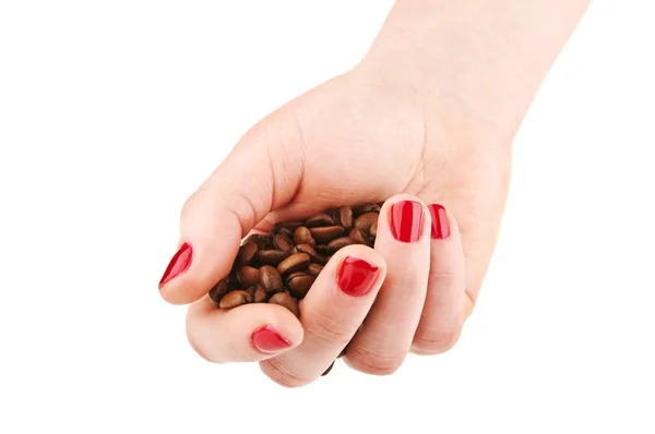 Femme tenant des grains de café — Photo