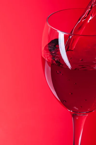 Wine into a glass — Stock Photo, Image