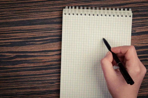 Woman write on notebook — Stockfoto