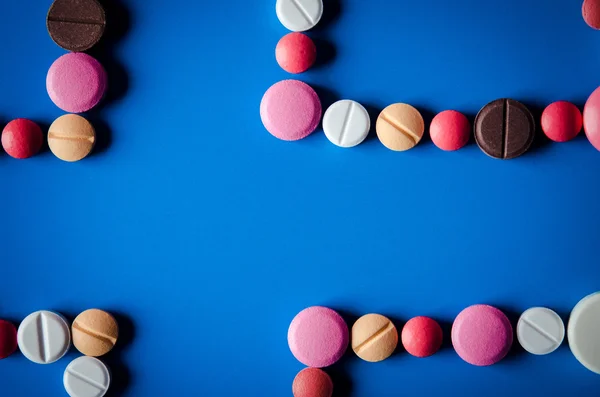 Colored pills and tablets — Stock Photo, Image