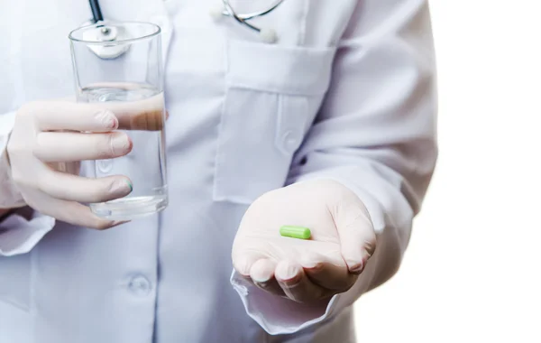 Pill and glass of water — Stock Photo, Image