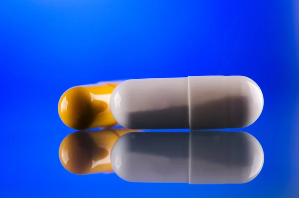 Close up of two pills capsule — Stock Photo, Image