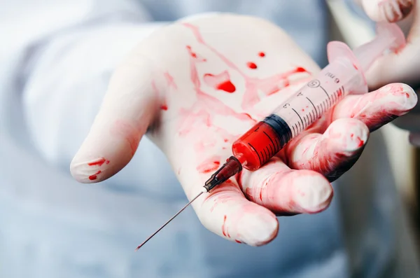 Syringe of blood — Stock Photo, Image