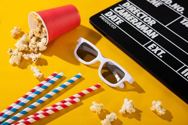 Glasses Popcorn Box Clapper Board Colored Cocktail Tube Yellow Background — Stock Photo, Image