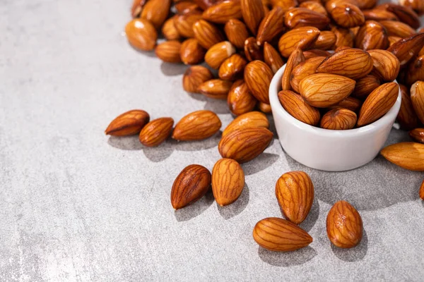 Sweet Almonds White Bowl Grey Stone Background — Stock Photo, Image