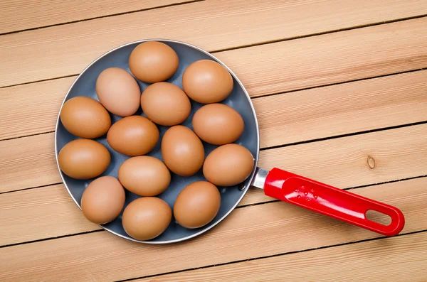Eggs on pan — Stock Photo, Image
