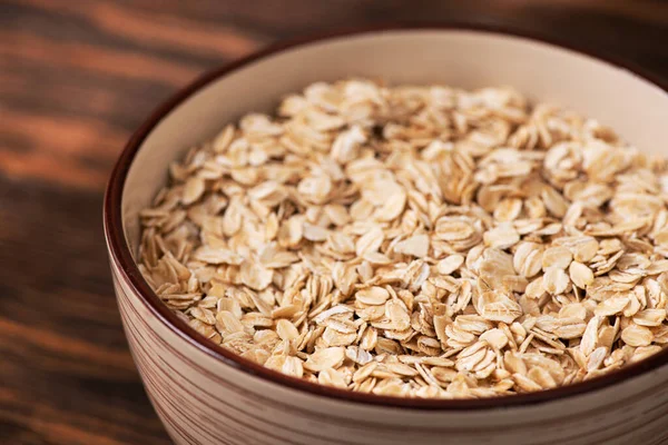 Cuenco Con Copos Avena Sobre Fondo Madera Dieta Concepto Desayuno —  Fotos de Stock