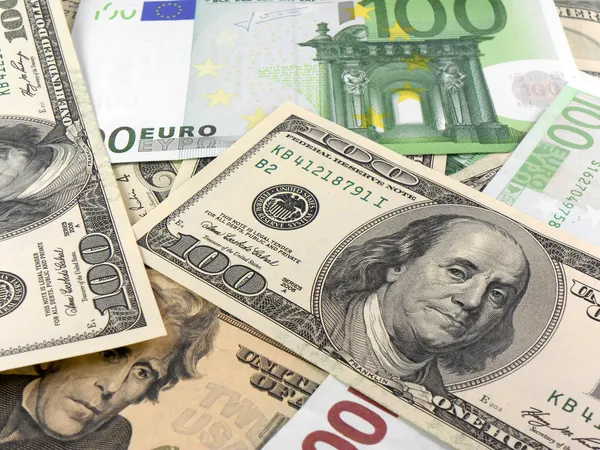 Bakgrund från euro och dollar sedlar — Stockfoto